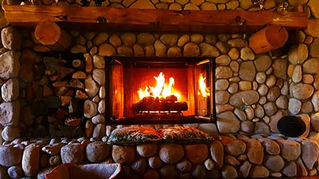 A fireplace, similar to the feeling of being under a massage table warmer.
